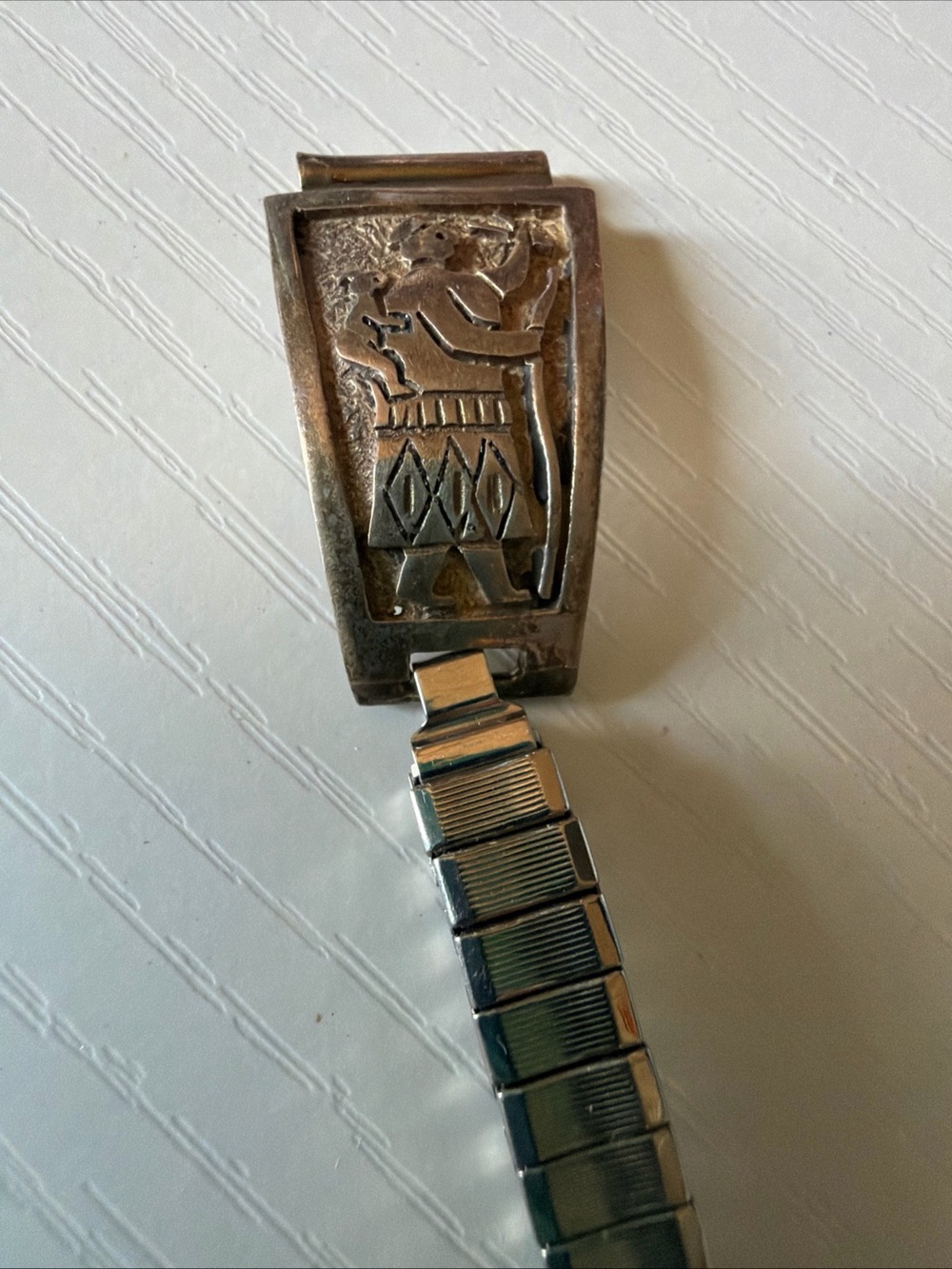 Silver-Tone Women's Bracelet Watch with Etched Tribal Motif it’s silver